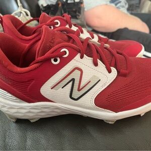 New Balance Men’s Red and White Athletic Cleatd